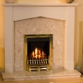 The Tudor Botticino Fireplace with Adam Radiant Brass Gas Fire