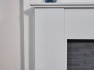 acantha-montara-white-marble-fireplace-with-downlights-bergen-electric-stove-in-charcoal-grey-54-inch