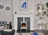 acantha-montara-in-white-marble-with-downlights-aviemore-electric-stove-in-white-54-inch
