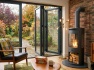 oko-s7-bio-ethanol-panoramic-stove-with-tall-angled-metal-stove-pipe-honed-black-granite-truncated-hearth