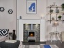 acantha-montara-white-marble-fireplace-with-downlights-aviemore-electric-stove-in-grey-enamel-54-inch
