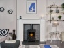 acantha-montara-white-marble-fireplace-with-downlights-aviemore-electric-stove-in-black-54-inch